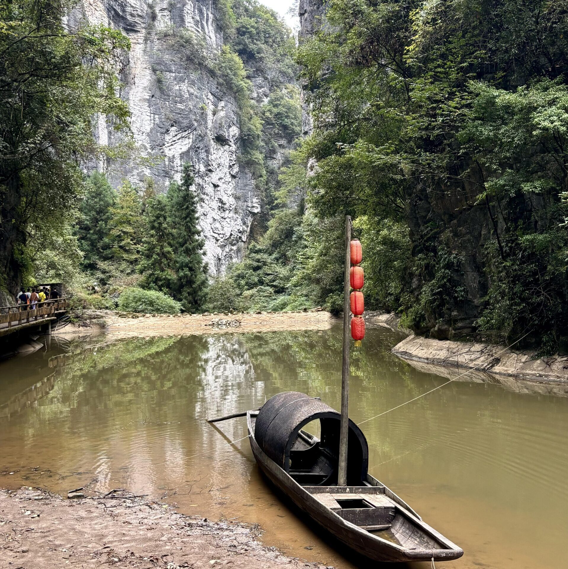 River scenery and traditional boats in Wulong during a Chongqing one day tour experience